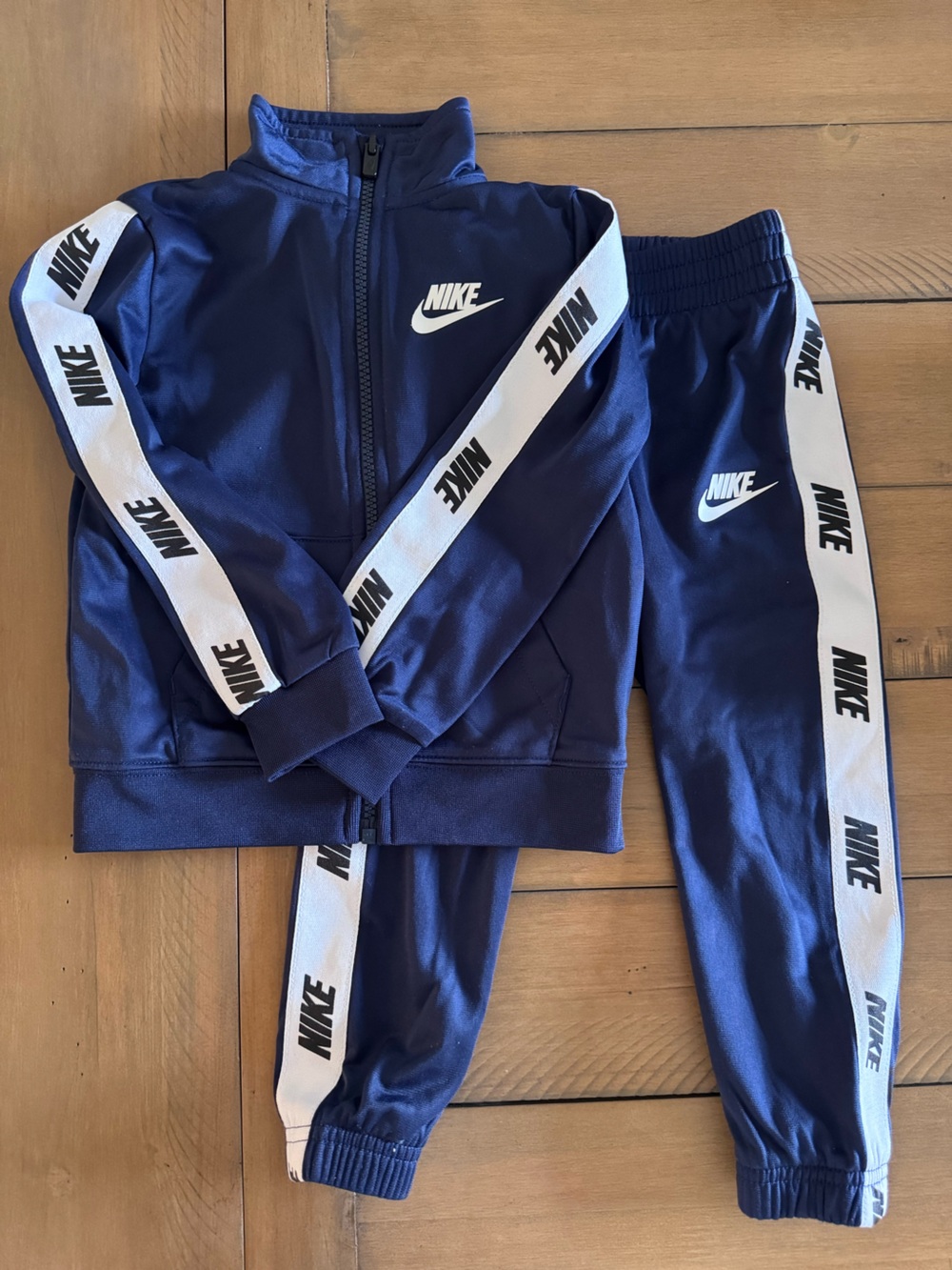 Nike Kids Navy Track Joggers with White Logo Tape